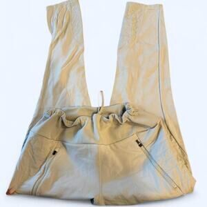 Athleta cream leggings with pockets